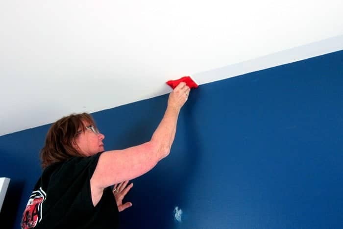 cutting in the ceiling with white ceiling paint