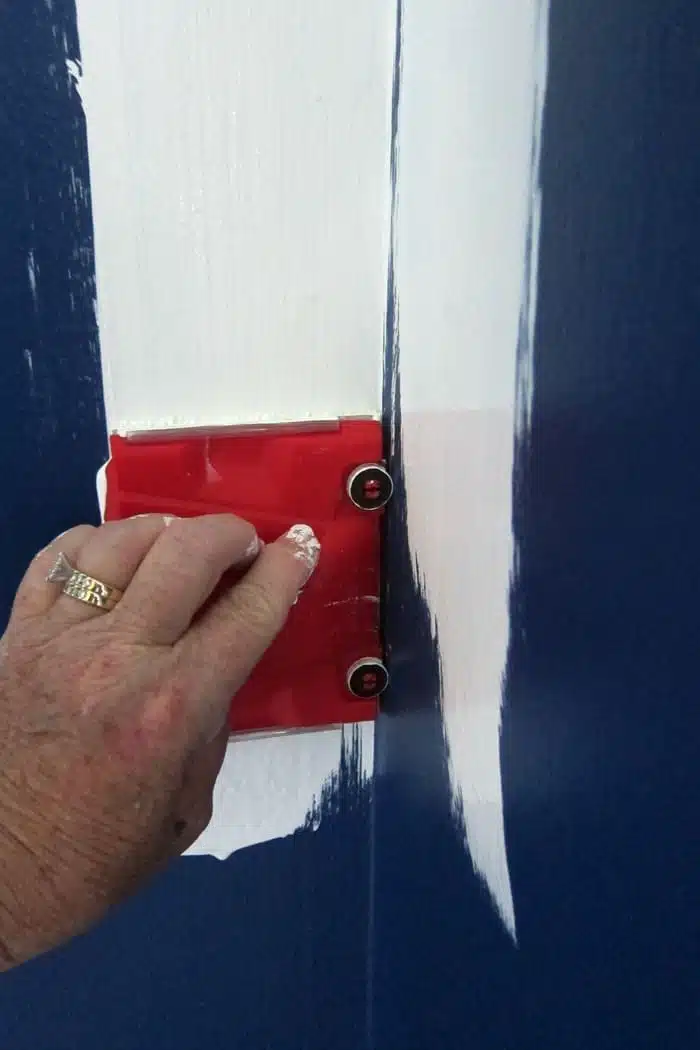 using a paint trim tool in corners