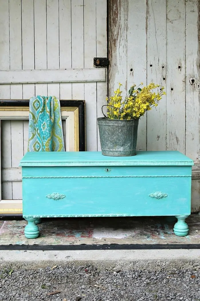 How to color wash furniture. Turquoise painted cedar chest with a light green color wash. 
