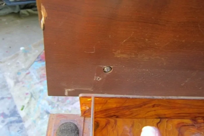 remove hardware and knobs from furniture before painting