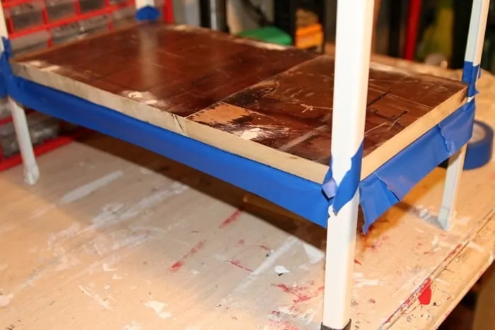 use painters tape to protect wood from paint
