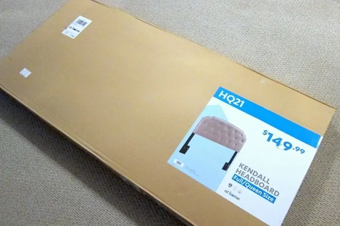 New upholstered headboard in box from the At Home Store