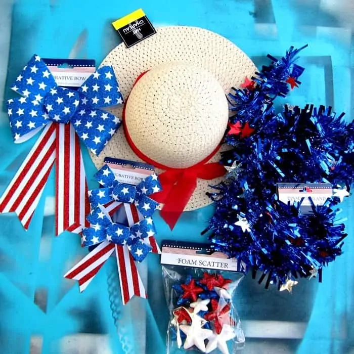 Supplies to make a Patriotic red white and blue Summer hat wreath from the Dollar Tree