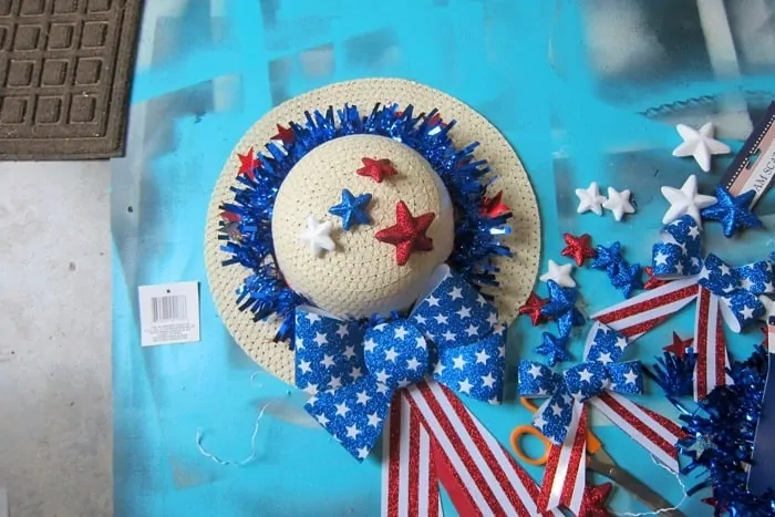 adding stars to a patriotic wreath