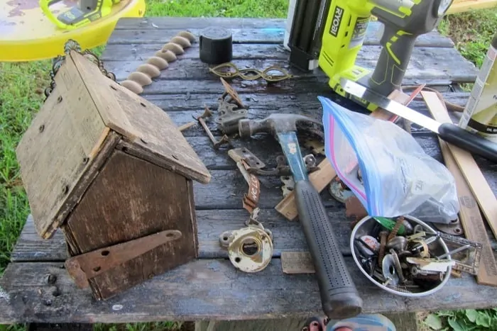 finding hardware and rusty treasures to decorate a wood birdhouse