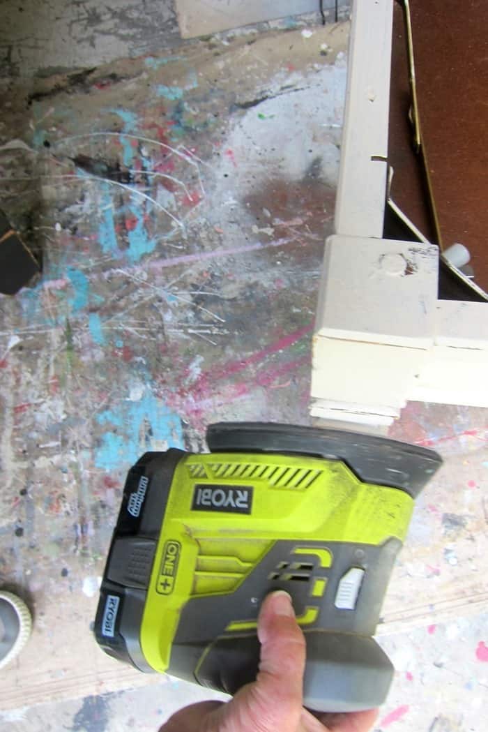 how to distress paint with a power sander