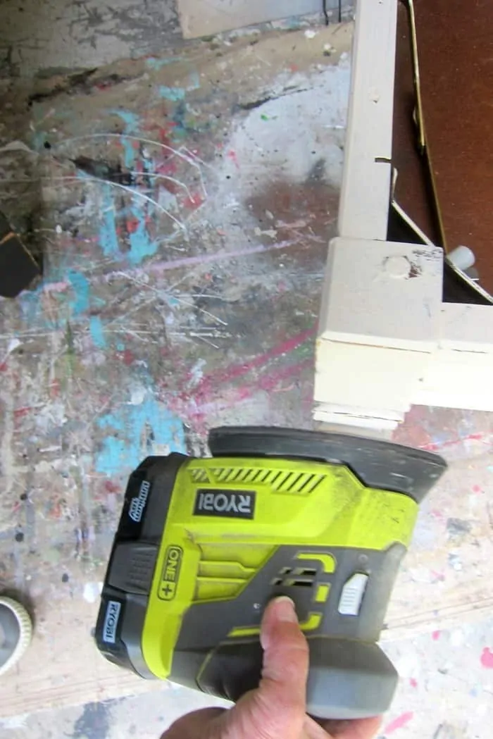how to distress paint with a power sander
