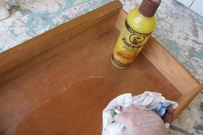 cleaning a furniture drawer with Howard's feed n wax