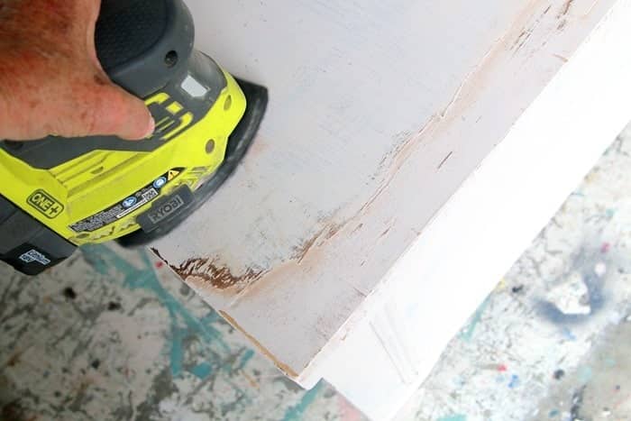how to distress painted furniture with a power sander
