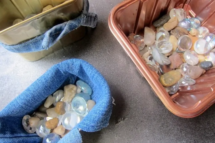 fill bottom of succulent planters with rocks