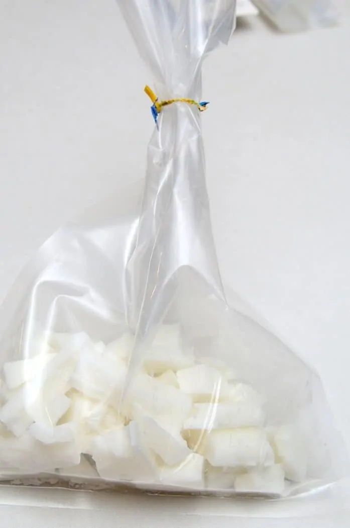 cut wax into small pieces and put in plastic bag made for melting wax