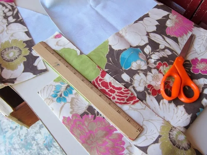 cutting up fabric to cover drawer bottom