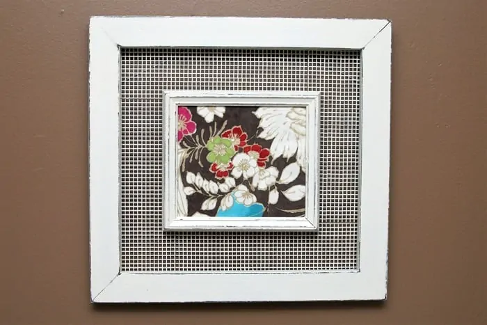 how to paint old picture frames and frame pretty fabric for new wall art