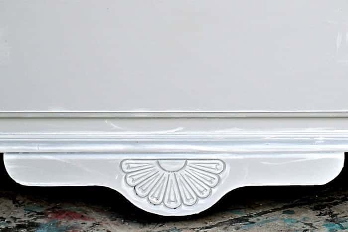 painted furniture detail highlighted with white paint