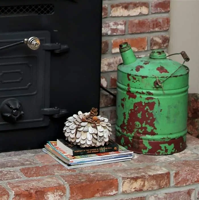 vintage gasoline can with rusty green paint