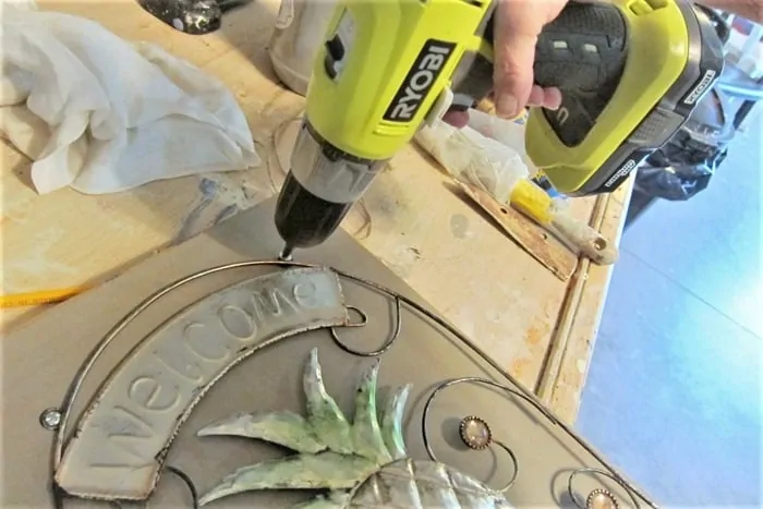 how to attach metal sign to wood