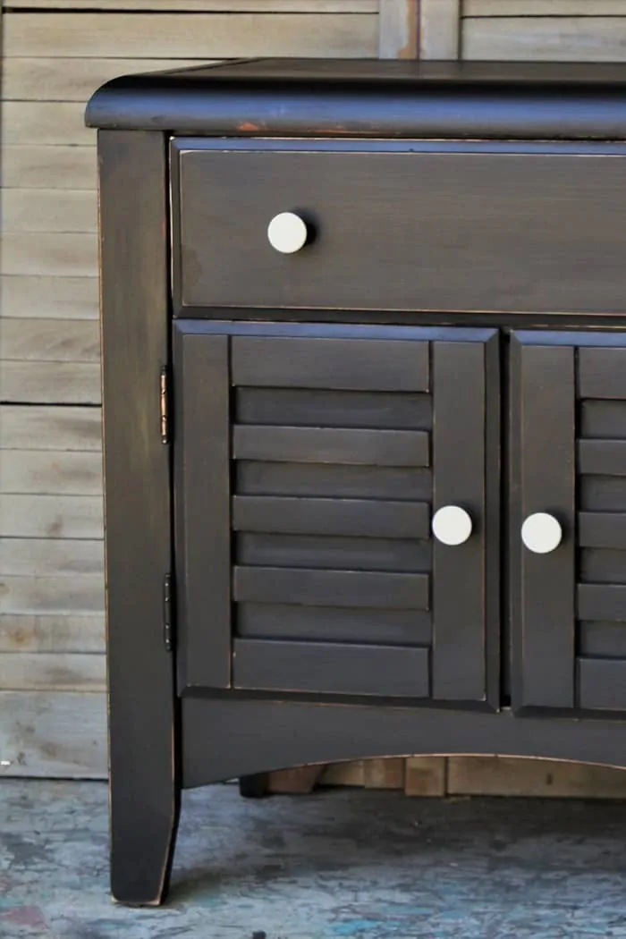 paint furniture black and add white knobs for drama (2)