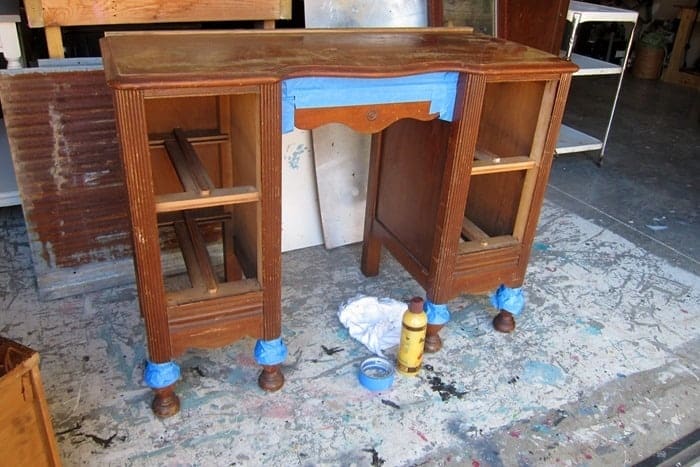 use painters tape to protect furniture from paint 