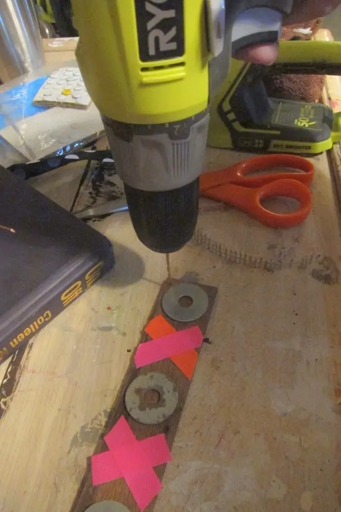 drilling a hole in wood using a Ryobi drill