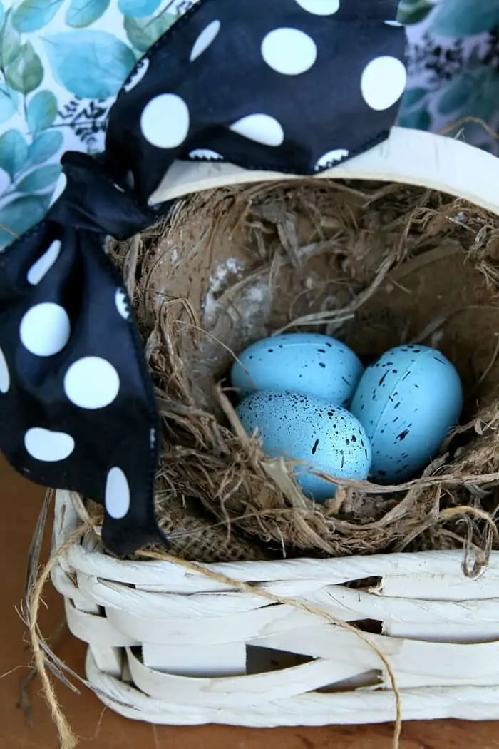 99 cent thrift store basket and bird nest with eggs display