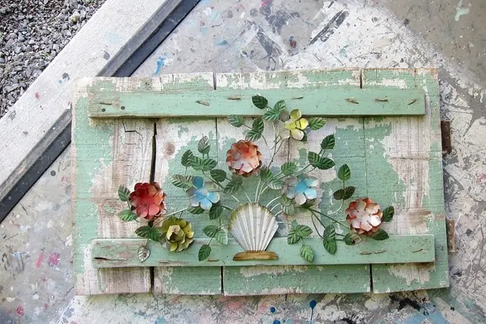 create unique wall or garden decor using vintage metal pieces and antique wood