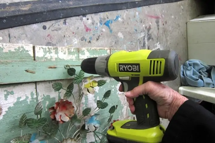 how to attach metal pieces to wood using a drill and screws