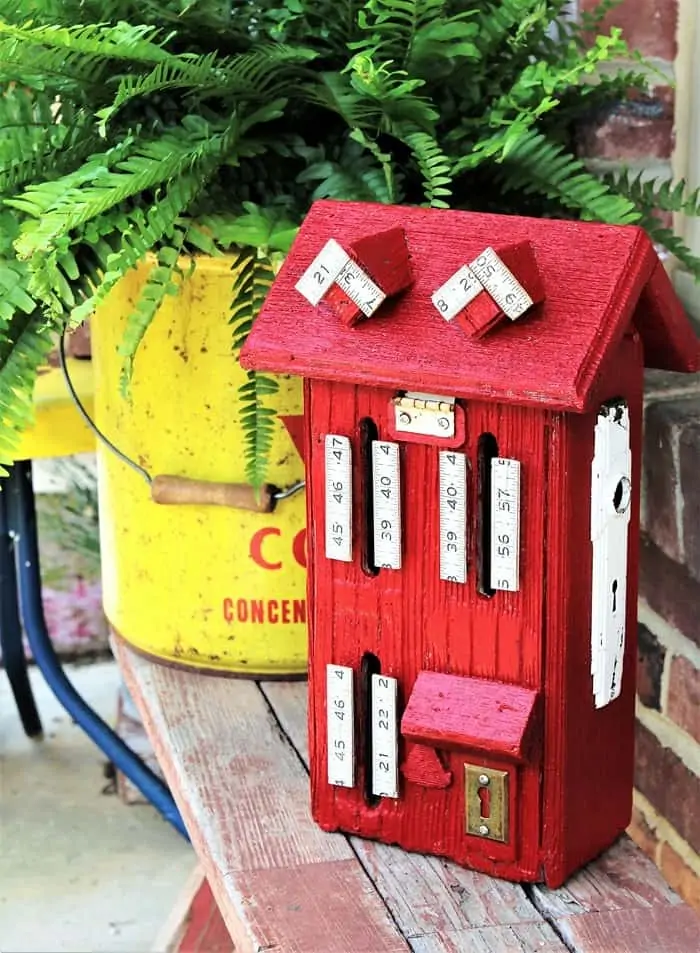 Butterfly house decorated with old wood rulers