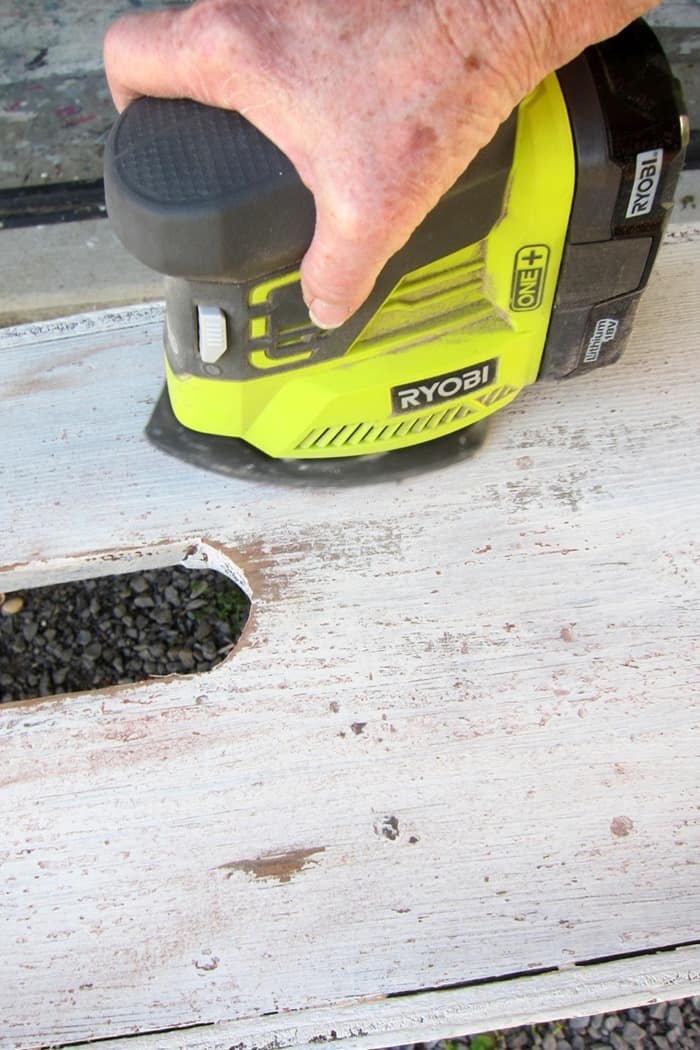 how to distress painted furnitue with a battery powered sander