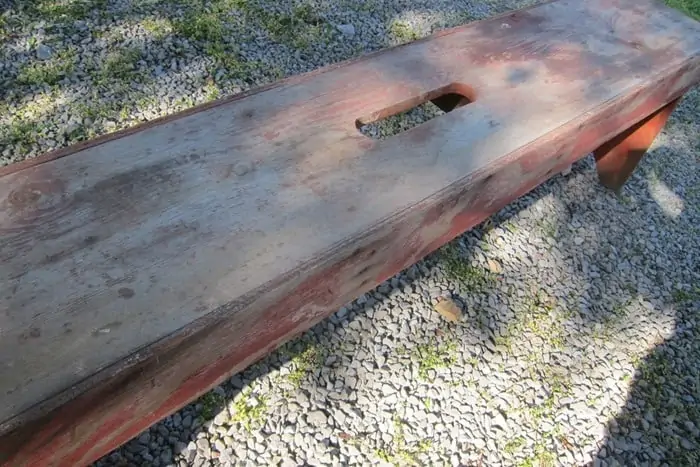 old bench with faded paint