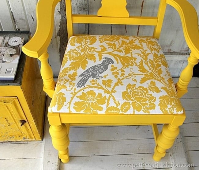 chair seat covered in yellow fabric