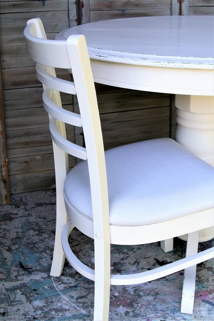 how to paint dining room chairs and recover the chair seats with drop cloths