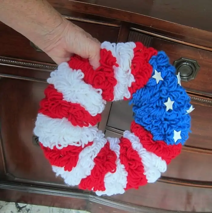 handmade yarn wreath in red white and blue