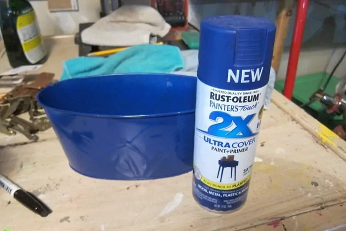spray paint a tin with Rustoleum Spray Paint
