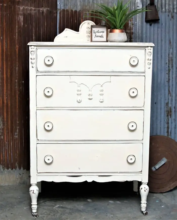 Furniture makeover with distressed white paint and big fat knobs