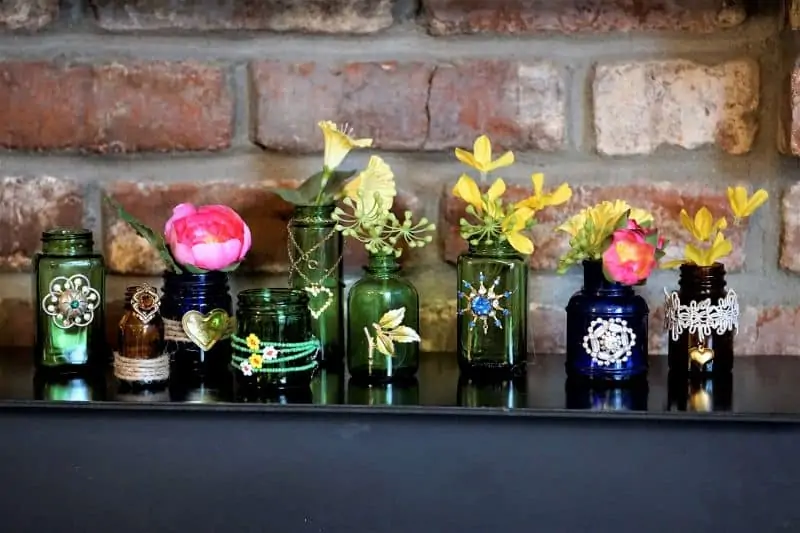 How to decorate blue and green bottles with old jewelry