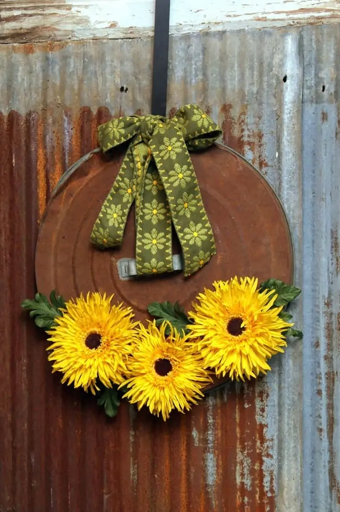 rusty can lid sunflower wreath for the door