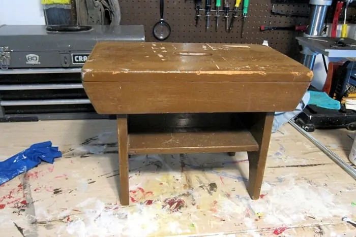 small wood stool bought at auction