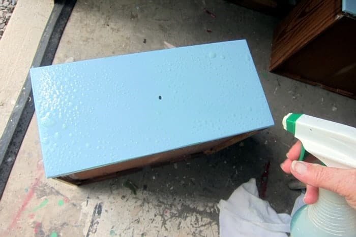 using household cleaner to wet distress furniture