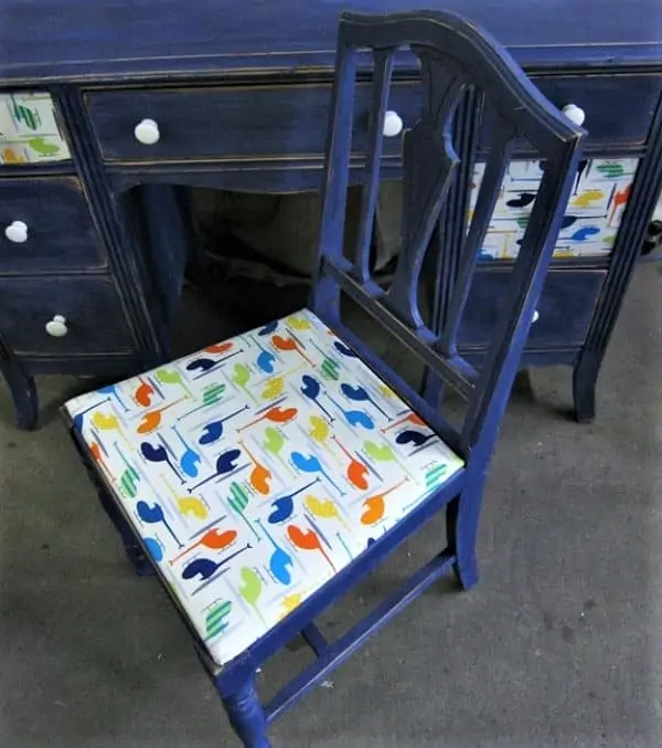 blue desk and chair with fabric seat