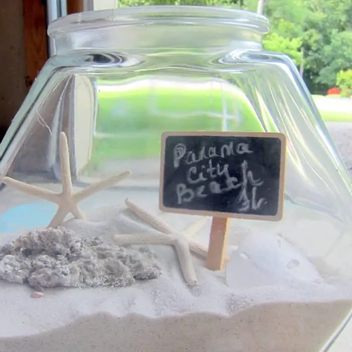 display sand and seashells in a vacation memory jar (9)