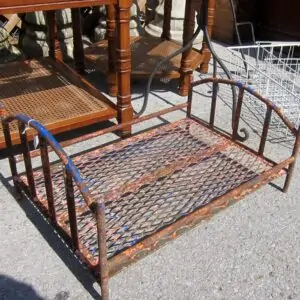 rustic wrought iron baby bed from the junk shop
