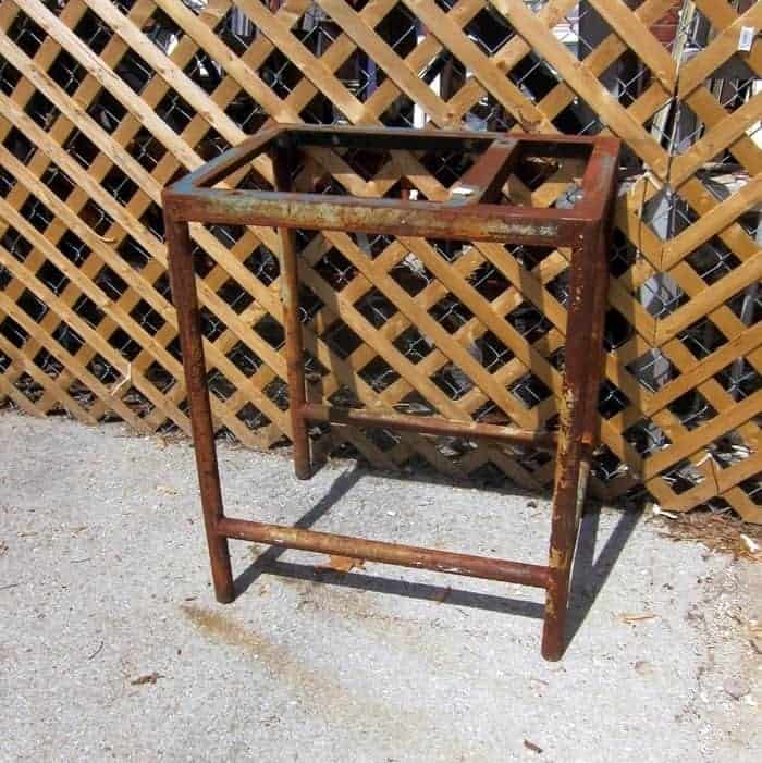 rusty iron table base