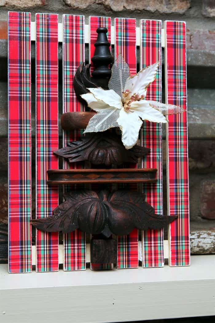 upcycled craft using wood drawer pulls on a Plaid background