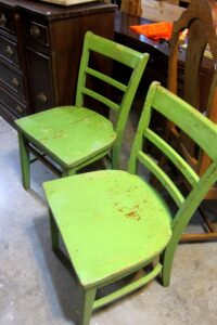pair of green chairs junk shopping find by Petticoat Junktion