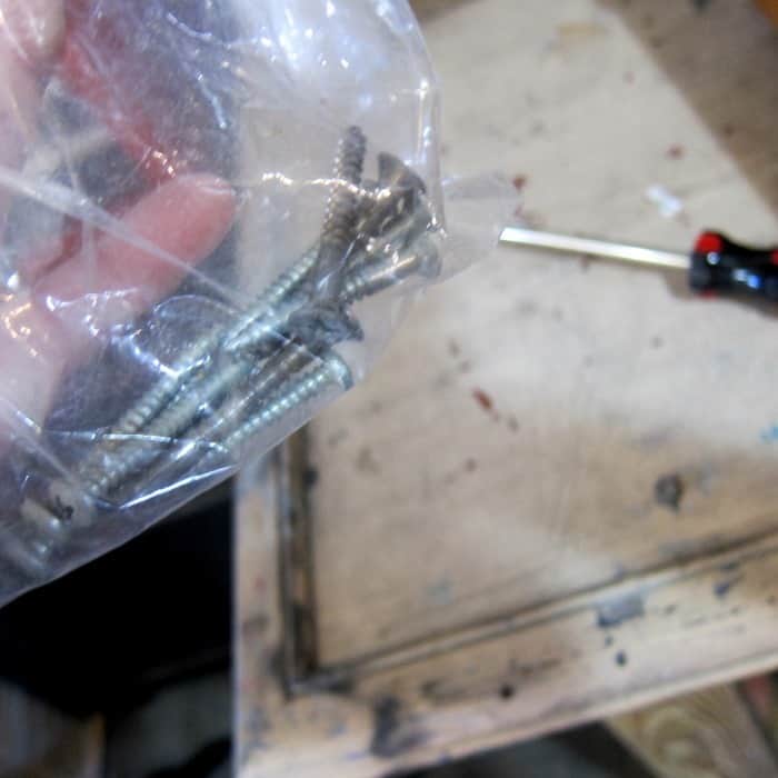 remove screws from furniture before painting and put in a plastic bag