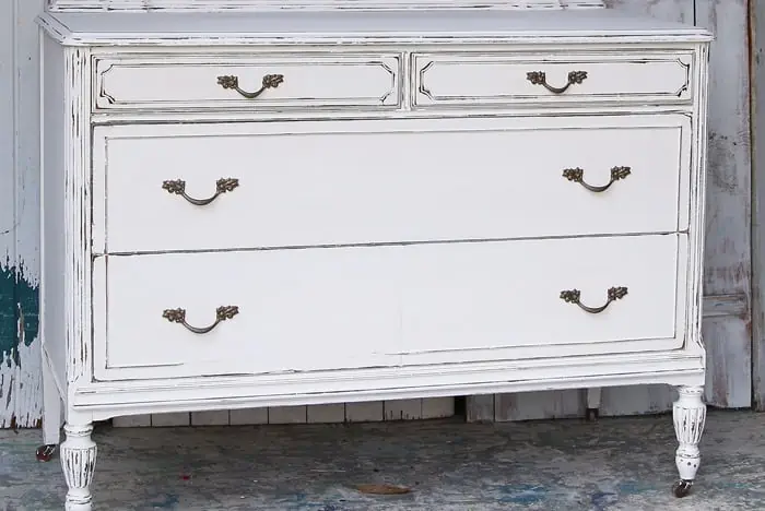 paint a dresser white and spray paint the drawer pulls