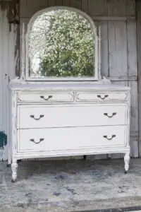 Paint an old dresser and distress the paint. Favorite painted furniture project of 2022