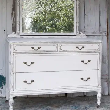 Paint an old dresser and distress the paint. Favorite painted furniture project of 2022