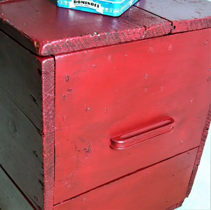 red blanket chest with wood handles