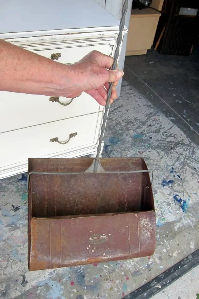 rusty old dust pan